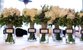 Rustic Bridesmaid Bouquets
Photography: D. Park Photography
Read More:
http://www.insideweddings.com/weddings/rustic-spring-wedding-in-southern-california/454/ White flower bouquet with greenery in vases