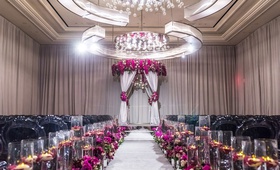 Deep Hues at Ceremony
Photography: Brian Leahy Photography
Read More:
http://www.insideweddings.com/weddings/a-hawaiian-couples-luxurious-destination-wedding-in-las-vegas/1226/ elegant las vegas wedding ceremony, fuchsia flowers, mirrored details, floating candles, grey chairs