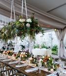 Wooden Head Table with Chandeliers
Photography: Leppert Photography
Read More:
http://www.insideweddings.com/weddings/autumnal-alfresco-garden-ceremony-tented-reception-in-cincinnati/1168/ wedding reception tent head table wood farm table vineyard chairs flower chandelier overhead
