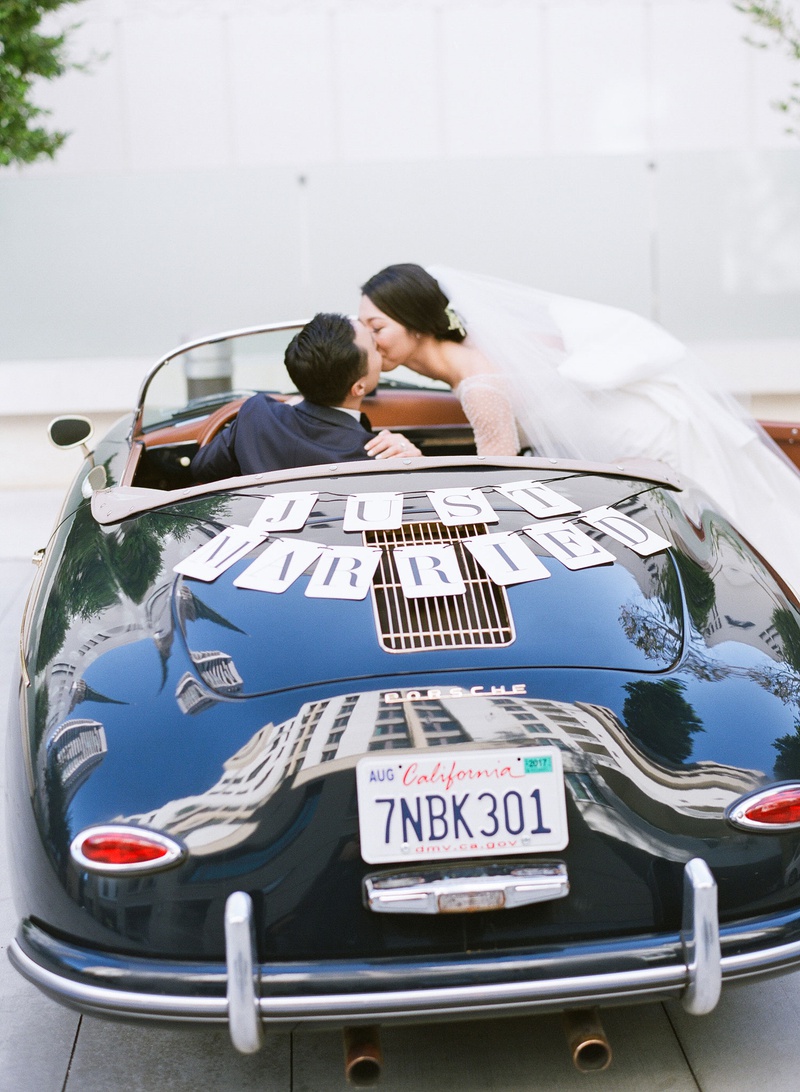 Bride %26 Groom in Porsche 356 Speedster
Photography: Michelle Beller Photography
Read More:
http://www.insideweddings.com/weddings/classic-ceremony-beachfront-ballroom-reception-in-santa-monica/1234/ bride kissing groom in just married car porsche 356 speedster california license place