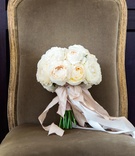 Ivory Rose Bridal Bouquet
Photography: Yvette Roman
Read More:
http://www.insideweddings.com/weddings/a-classic-wedding-with-rustic-touches-at-a-villa-in-santa-barbara/674/ Wedding bouquet with white roses tied with pink ribbon