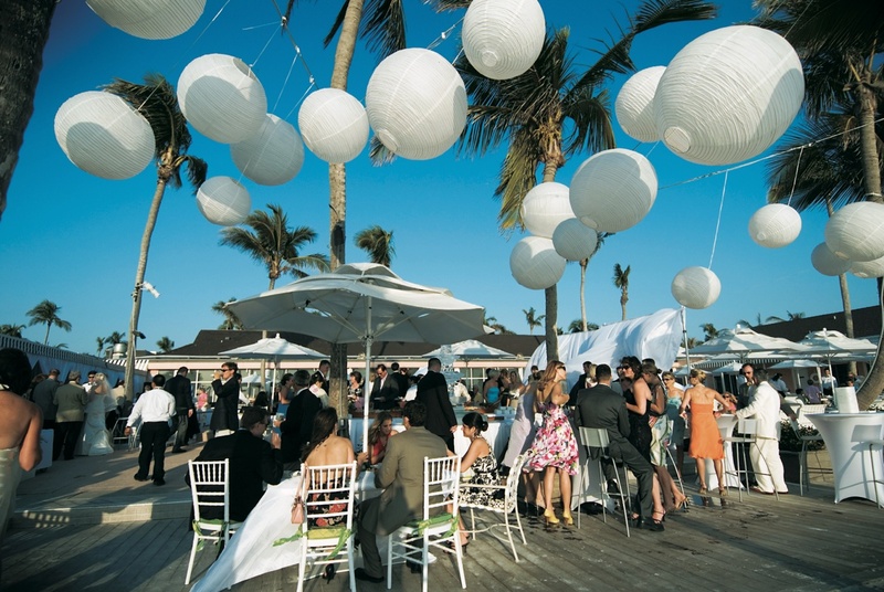 White Paper Lanterns
Photography: Mermin + Christie Photographers
Read More:
http://www.insideweddings.com/weddings/tropical-theme-beach-wedding-in-naples-florida/184/ round white paper lanterns hung above outdoor reception