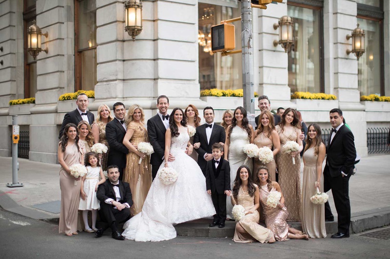 Large Wedding Party in New York City
Photography: The Day by Ira Lippke
Read More:
http://www.insideweddings.com/weddings/opulent-luxury-wedding-with-timeless-color-palette-in-new-york-city/1199/ bride and groom with wedding party gold dresses tuxedos bow ties white flowers ring bearers flower