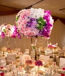 Colorful Wedding Centerpiece
Photography: Bob %26 Dawn Davis Photography
Read More:
http://www.insideweddings.com/weddings/oceanfront-ceremony-opulent-pink-and-metallic-reception/407/ Pink, purple, green, and blue flower centerpiece at reception