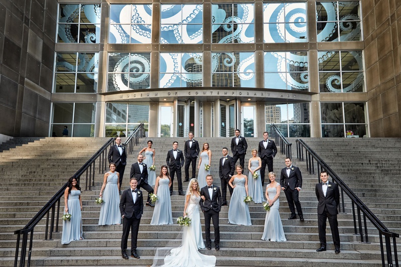 Bridesmaids %26 Groomsmen on Steps
Photography: KingenSmith
Read More:
http://www.insideweddings.com/weddings/modern-romantic-wedding-with-glam-geometric-details-in-chicago/1171/ Bride and groom with groomsmen in suits and bridesmaids in long light blue bridesmaid dresses