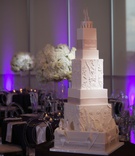 Square-Tier Wedding Cake Design
Photography: Old South Studios
Read More:
http://www.insideweddings.com/weddings/retired-nba-player-brendan-haywoods-bold-modern-wedding/1381/ white cake square tier layers cake topper initial bows and designs lace appliques