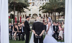 Ceremony at Florida Hotel VEnue
Photography: Wedding Photography by Liam
Read More:
http://www.insideweddings.com/weddings/outdoor-destination-wedding-at-an-oceanfront-resort-in-florida/1193/ bride and groom with pastor at acqualina resort & spa outdoor wedding on lawn