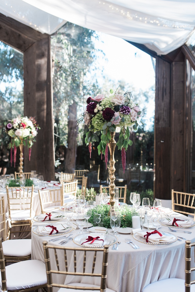 Fall Centerpiece on Tall Gold Stand
Photography: Hello Blue Photo
Read More:
http://www.insideweddings.com/weddings/boho-chic-wedding-with-traditional-jewish-ceremony-in-malibu/1156/ tall centerpiece on gold stand with fall flowers and greenery
