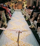 Aisle Runner
Photography: John Solano Photography
Read More:
http://www.insideweddings.com/weddings/star-studded-beverly-hills-wedding-with-casino-game-entertainment/153/ White aisle runner decorated with white and yellow rose petals