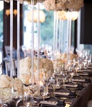 Clear Stands Topped with Fresh Flowers
Photography: Duke Photography
Read More:
http://www.insideweddings.com/weddings/alfresco-ceremony-modern-reception-in-southern-california/1123/ Wedding reception long table dark grey linen tall lucite acrylic riser white flowers low flowers