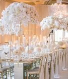Crystal Chandeliers and Tall Floral Arrangements
Photography: Joe Buissink Photography
Read More:
http://www.insideweddings.com/weddings/a-music-executives-opulent-ivory-gold-wedding-in-beverly-hills/1115/ opulent wedding reception with ivory and gold, floral arrangements on tall gold stands, chandeliers