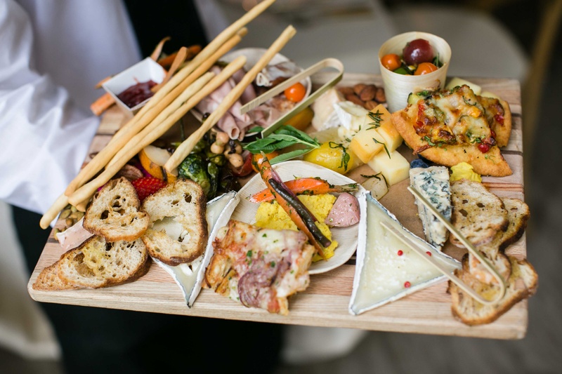 Elaborate Crostini Board
Photography: Samuel Lippke Studios
Read More:
http://www.insideweddings.com/weddings/a-rustic-camp-themed-outdoor-wedding/908/ Crostini board with artisan meat fresh cheese slices olive flatbread olive oil dips vegetables