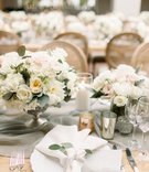 Wood Table with Muted Low Centerpieces
Photography: Brett Hickman Photographers
Read More:
http://www.insideweddings.com/weddings/taylour-rutledge-and-shane-vereen/1276/ wedding reception long wood table linen runner white garden rose eucalyptus centerpiece candles