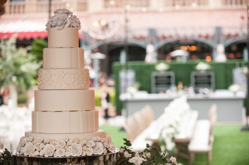 Ivory Cake with Various Layers
Photography: Triple Cord Photography
Read More:
http://www.insideweddings.com/weddings/destination-wedding-with-outdoor-reception-lavish-after-party/982/ Tall white ivory cake with sugar flowers stripe flower details