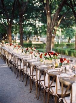 Rustic Elegance
Photography: Sarah Kate, Photographer
Read More:
http://www.insideweddings.com/inspiration/board/148/dfw-events/receptions-to-remember/ A rustic tablescape accented by red blooms stretches endlessly across an outdoor reception area.
