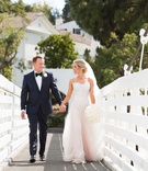 Bride %26 Groom Hold Hands on Bridge
Photography: Duke Photography
Read More:
http://www.insideweddings.com/weddings/alfresco-ceremony-modern-reception-in-southern-california/1123/ Bride in strapless wedding dress holding groom hand on bridge in california holding round bouquet