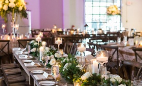 Rustic Elements at Whiskey Distillery
Photography: Vue Photography
Read More:
http://www.insideweddings.com/weddings/romantic-rustic-chic-wedding-at-a-whiskey-distillery-in-atlanta/942/ candlelight and tall centerpieces with long wooden tables and greenery