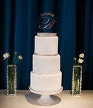 White Cake and Bedazzled Vases
Photography: Jasmine Star Photography
Read More:
http://www.insideweddings.com/weddings/inspired-bridal-shower-a-dazzling-day-of-delights/489/ Three flavor white cake with shiny vases