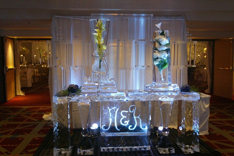 Custom Ice Martini Bar
Photography: Lyn Sims Photographer
Read More:
http://www.insideweddings.com/weddings/glamorous-fall-wedding-with-garden-touches-in-tucson-arizona/258/ Ice sculpture with initials etched in center