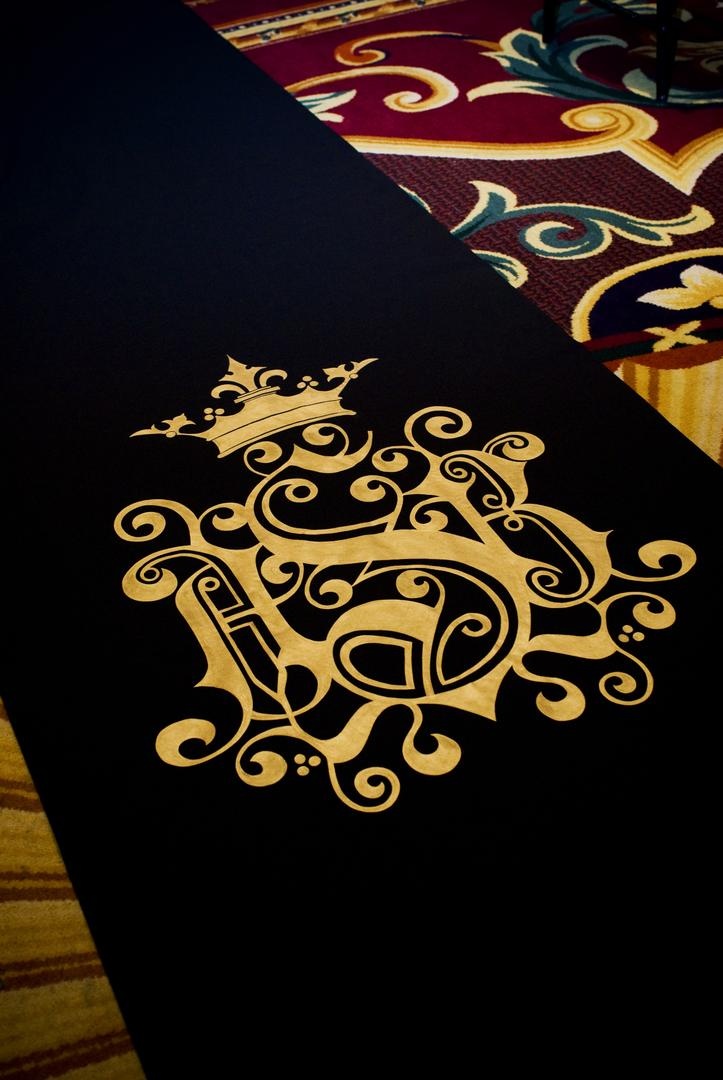 Black Aisle Runner
Photography: Barnet Photography
Read More:
http://www.insideweddings.com/weddings/ashley-reeves-and-brandon-saller/261/ Black aisle runner with gold monogram design by The Original Runner Company for a wedding