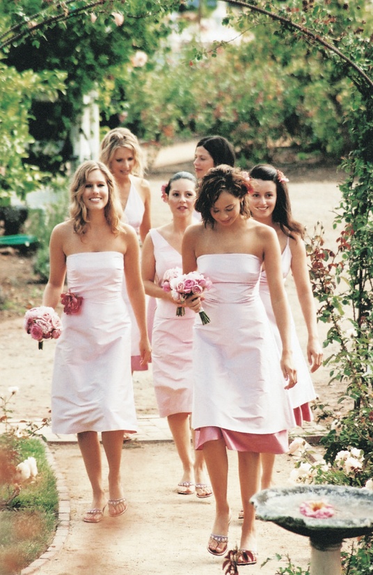 Custom Bridesmaid Dresses
Photography: Amy Kumler Photography
Read More:
http://www.insideweddings.com/weddings/outdoor-wedding-at-a-california-rose-farm/18/ Bridesmaids in pink dresses walk through rose garden