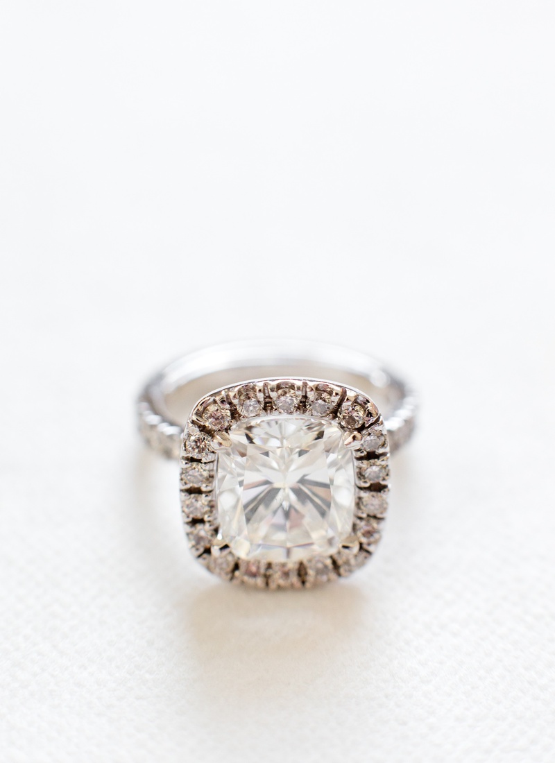 Halo Engagement Ring
Photography: Aaron Delesie Photographer
Read More:
http://www.insideweddings.com/weddings/elegant-all-white-country-club-wedding-with-natural-greenery/530/ Cushion-cut diamond engagement ring with halo setting