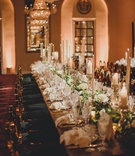 Romantic Long Reception Table Décor
Photography: LuxRox
Read More:
http://www.insideweddings.com/weddings/alfresco-inspired-luxurious-hotel-wedding-in-washington-dc/1312/ wedding reception long table green gold chairs taper candles chandelier white flowers greenery luxe