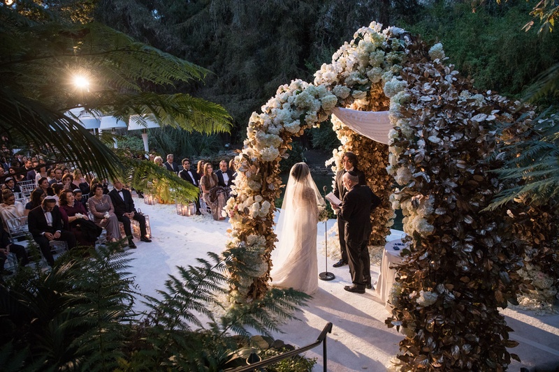 Bride %26 Groom Exchanging Vows Under Arch
Photography: Samuel Lippke Studios
Read More:
http://www.insideweddings.com/weddings/glamorous-alfresco-ceremony-ballroom-reception-and-after-party/1041/ Bride in veil and wedding dress saying vows under chuppah flower in Bel-Air sunlight streaming in