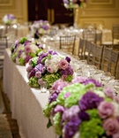 Head Table Arrangements
Photography: Walters %26 Walters
Read More:
http://www.insideweddings.com/weddings/classic-country-club-wedding-in-north-carolina/423/ Bunches of purple and green flowers on tables