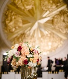 Burgundy %26 Apricot Wedding Centerpieces
Photography: Karlisch Photography
Read More:
http://www.insideweddings.com/weddings/a-festive-new-years-eve-wedding-at-an-art-deco-venue-in-dallas/1053/ Mercury glass centerpiece with light peach hydrangeas, red roses, pink roses, white hydrangeas gold
