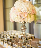Golden Table Card Display
Photography: Studio EMP
Read More:
http://www.insideweddings.com/weddings/oceanfront-santa-barbara-wedding-with-romantic-color-palette/463/ Gold frame escort cards with white and blush flower arrangement