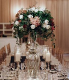 Tall Fall-Inspired Centerpiece
Photography: Jordan Voth Photography
Read More:
http://www.insideweddings.com/weddings/suzanna-villarreal-and-alex-wood/1150/ Suzanna Villarreal and Alex Wood LA Dodgers wedding reception centerpiece mercury glass fall decor