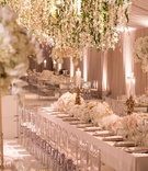 Floral Chandeliers in Blush Tent
Photography: Samuel Lippke Studios
Read More:
http://www.insideweddings.com/weddings/glamorous-alfresco-ceremony-ballroom-reception-and-after-party/1041/ Wedding reception blush tent long table clear chairs white flowers gold candleholders greenery over