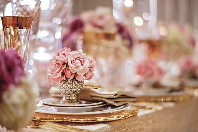 Small Arrangement of Pink Flowers
Photography: Carasco Photography
Read More:
http://www.insideweddings.com/weddings/a-regal-modern-ethereal-inspirational-wedding-shoot-in-chicago/667/ Pink roses in silver and gold vase on top of tablescape