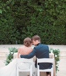 Bride %26 Groom at Sweetheart Table
Photography: Lucas Rossi and Michelle Kyle
Read More:
http://www.insideweddings.com/weddings/inspirational-outdoor-garden-wedding-shoot-with-modern-elements/687/ Bride in an Anne Barge wedding dress sits with groom in a teal tuxedo jacket at garden reception