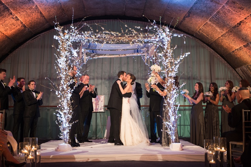 Couple's First Kiss Under Chuppah
Photography: Ira Lippke Studios
Read More:
http://www.insideweddings.com/weddings/chic-classic-new-york-city-wedding-with-personal-touches/783/ a bride and groom share their first kiss as a married couple at the end of their jewish ceremony