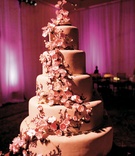 Cherry Blossom Cake
Photography: Ira Lippke Studios
Read More:
http://www.insideweddings.com/weddings/eastern-themed-summer-wedding-at-the-montage-laguna-beach/209/ cake decorated with edible pink cherry blossoms