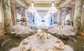 White Florals in Reception Space
Photography: Eli Turner Studios
Read More:
http://www.insideweddings.com/weddings/elegant-and-romantic-jewish-ballroom-wedding-in-washington-dc/1109/ clear back chairs, white and gold reception decor, marble columns, white flower centerpieces