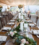 Long Wooden Tale with Verdant Runner
Photography: Michael Bambino %26 Co.
Read More:
http://www.insideweddings.com/weddings/whimsical-open-air-secret-garden-wedding-with-soft-spring-hues/777/ long wooden table with white lace runner on top of verdant runner with foliage and flowers