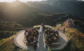 Bird's Eye View of Helipad Wedding
Photography: Hugh Forte
Read More:
http://www.insideweddings.com/weddings/gorgeous-alfresco-wedding-with-stunning-mountain-views-in-malibu/966/ bird's eye view of helipad ceremony at malibu rocky oaks