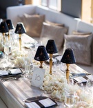 Beaded Mini Lamp Shades
Photography: Christian Oth Studio
Read More:
http://www.insideweddings.com/weddings/traditional-chinese-tea-ceremony-glamorous-new-york-city-wedding/884/ Rainbow Room wedding reception restaurant flower runner gold lamps with bead lampshades bench