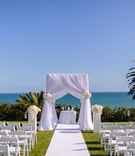 Oceanfront All-White Chuppah
Photography: Brian Leahy Photography
Read More:
http://www.insideweddings.com/weddings/oceanfront-interfaith-wedding-ceremony-with-classic-white-details/840/ white chuppah, chuppah with white cloth and white flowers