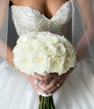 Bride Holding White Rose Bouquet
Photography: Travis Harris Photography
Read More:
http://www.insideweddings.com/weddings/romantic-wedding-with-ivory-champagne-gold-palette-in-florida/709/ Bride in Ines Di Santo beaded wedding dress with ivory rose bouquet