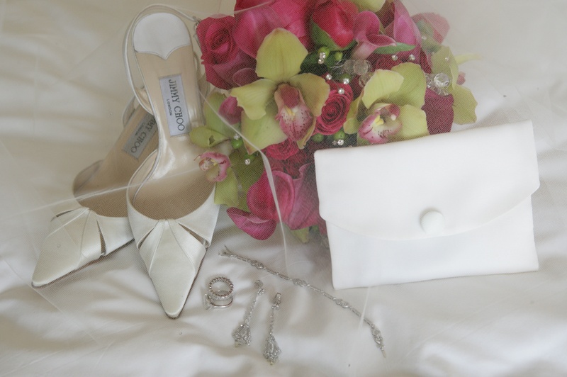 Ivory Shoes and White Clutch
Photography: Curtis Dahl Photography
Read More:
http://www.insideweddings.com/weddings/bohemian-inspired-los-angeles-wedding-with-bright-color-palette/185/ Jimmy Choo wedding shoes and white fold bridal bag
