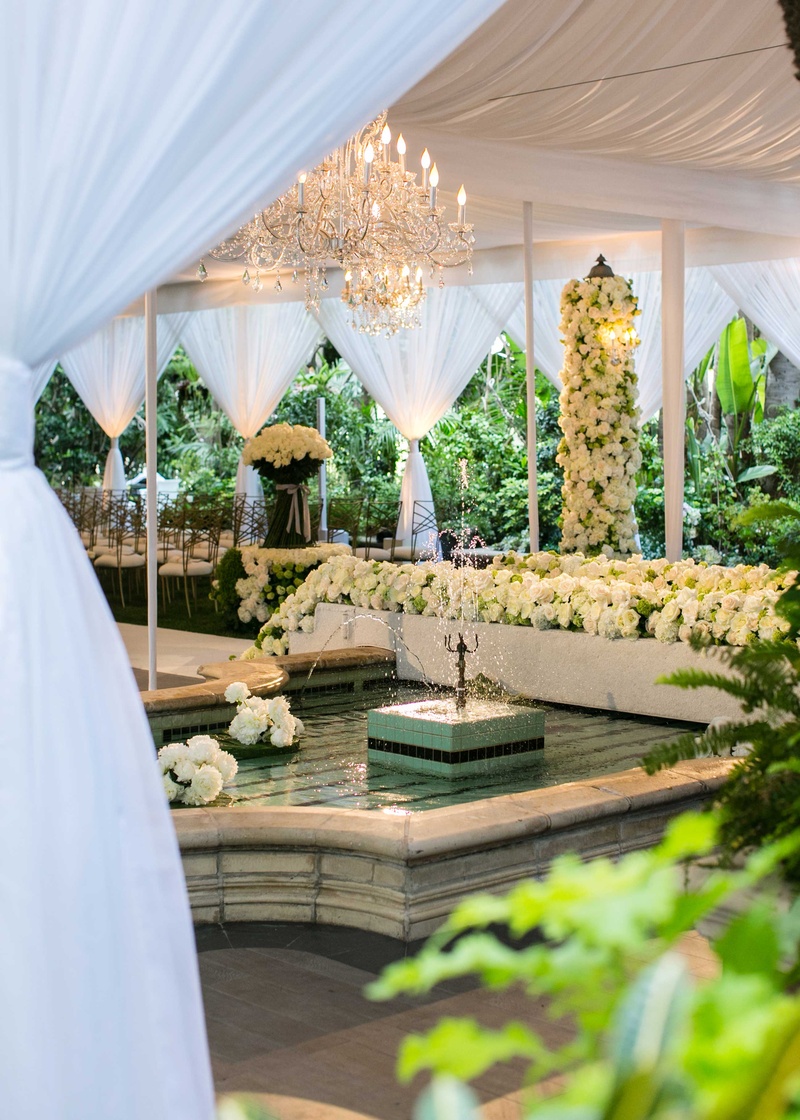 Wedding Ceremony Venue with Fountain
Photography: Samuel Lippke Studios
Read More:
http://www.insideweddings.com/weddings/romantic-jewish-wedding-with-lush-ivory-flowers-rose-gold-details/790/ White drapes wedding ceremony space with fountain white rose greenery gold chairs