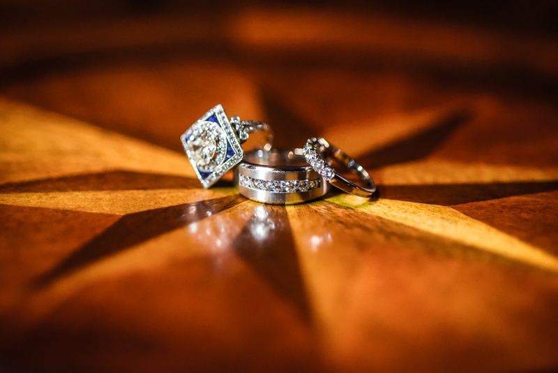 Art Deco Engagement Ring with Wedding Bands
Photography: Joe Photo
Read More:
http://www.insideweddings.com/weddings/the-unique-and-intimate-wedding-of-trains-bassist-hector-maldonado/879/ art deco engagement ring with sapphire details with half-eternity band and channel set men's ring