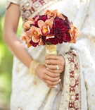 Bride's Bouquet
Photography: Mi Belle Photographers
Read More:
http://www.insideweddings.com/weddings/elegant-red-gold-wedding-in-malibu-california/366/ Bride's bouquet of red and orange flowers