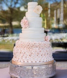 Pink Rose Wedding Cake
Photography: Robert Evans Studios
Read More:
http://www.insideweddings.com/weddings/an-austin-texas-lake-house-wedding-with-a-natural-color-palette/568/ Ivory fondant cake decorated with rosebuds