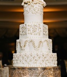 Classic Wedding Cake with Floral Pattern
Photography: Dear Stacey
Read More:
http://www.insideweddings.com/weddings/sentimental-alfresco-ceremony-classic-reception-at-oheka-castle/1016/ White wedding cake round hexagon layers flowers vines and flowers on top