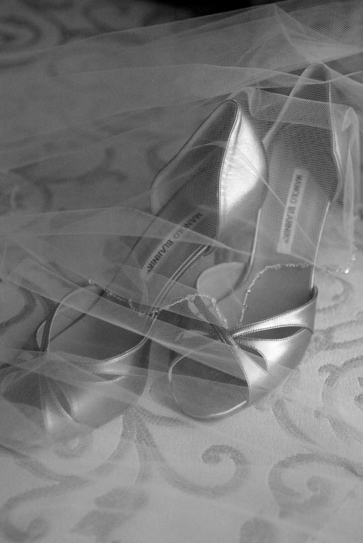 Metallic Wedding Shoes
Photography: Lyn Sims Photographer
Read More:
http://www.insideweddings.com/weddings/glamorous-fall-wedding-with-garden-touches-in-tucson-arizona/258/ Manolo Blahnik silver pumps